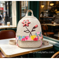 Mochila multifuncional de lino y algodón con patchwork floral